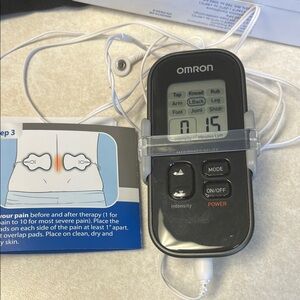OMRON Black and Silver Pain Relief Device‎